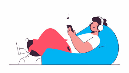 Obraz premium Relaxed person listening to music on smartphone in beanbag chair