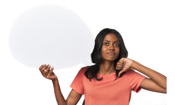 Indian woman with dialogue bubble showing a dislike gesture, thumbs down. Disagreement concept.