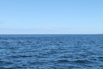 The Clear Blue Water and Sky of an Ocean Seascape.