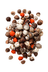 Obraz premium A striking overhead view captures a collection of interesting seed pods against black.