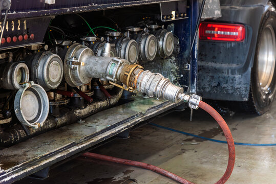 Fototapeta Tanker truck wash station, interior cleaning of the tank through the lower outlets using pressurized water and steam.