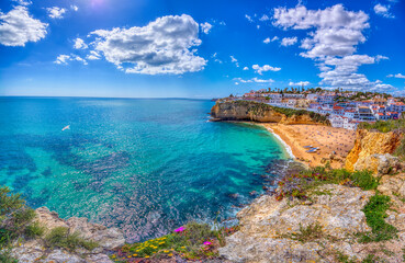 Fototapeta premium Carvoeiro fishing village with beautiful beach in Algarve, Portugal.