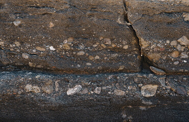 Layer of small stones inside the sedimentary rock that is conglomerate