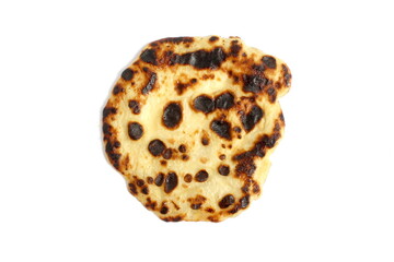 There is a thin pancake on a white background.