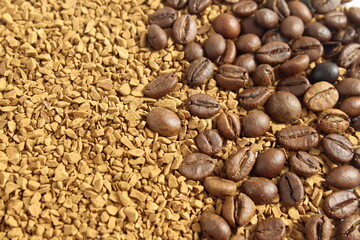 Instant coffee and coffee beans are in the same background.	