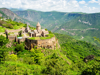 above view of Tatev Monastery over green gorge