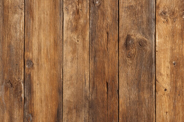 Close-up of weathered wooden slats with cracks and rustic grain texture