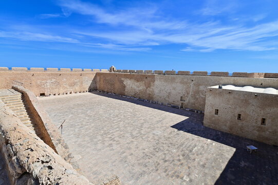 Massive Stone Ramparts and Courtyard of Borj El Kebir Ottoman Fortress in Mahdia's Old Town, Tunisia