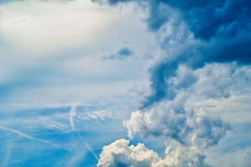 An intentionally soft-focus image of a dramatic sky with evocative clouds, designed as a subtle backdrop for creatives—allowing foreground elements in web or media projects to take center stage
