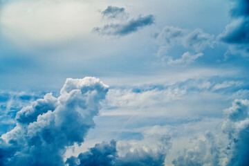 An intentionally soft-focus image of a dramatic sky with evocative clouds, designed as a subtle backdrop for creatives—allowing foreground elements in web or media projects to take center stage