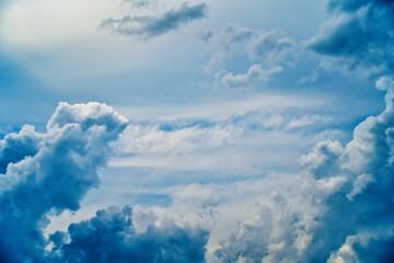 An intentionally soft-focus image of a dramatic sky with evocative clouds, designed as a subtle backdrop for creatives—allowing foreground elements in web or media projects to take center stage