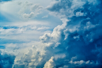 An intentionally soft-focus image of a dramatic sky with evocative clouds, designed as a subtle backdrop for creatives—allowing foreground elements in web or media projects to take center stage
