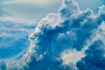An intentionally soft-focus image of a dramatic sky with evocative clouds, designed as a subtle backdrop for creatives—allowing foreground elements in web or media projects to take center stage