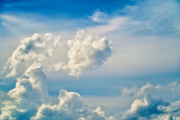 An intentionally soft-focus image of a dramatic sky with evocative clouds, designed as a subtle backdrop for creatives—allowing foreground elements in web or media projects to take center stage
