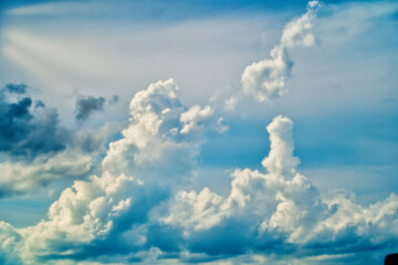 An intentionally soft-focus image of a dramatic sky with evocative clouds, designed as a subtle backdrop for creatives—allowing foreground elements in web or media projects to take center stage