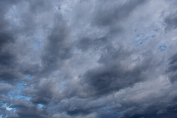 Fototapeta premium Central Kazakhstan. View of the gloomy dramatic sunset sky with dark clouds.