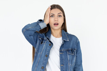 Photo of scared impressed lady wear jeans coat open mouth arm head isolated white color background