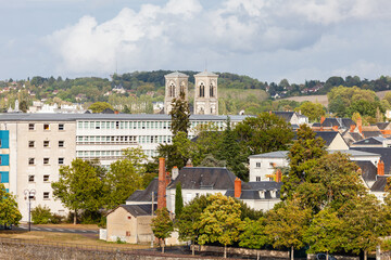 Obraz premium Notre Dame of Chatellerault church, France: city center, mix of medieval architecture and modern architecture with remnants of industrial era