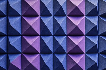Fototapeta premium Textured acoustic foam panel in a pyramid pattern featuring blue