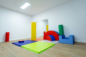 Colorful rehabilitation and physical therapy room for inclusive exercises - Concept of health, wellness and inclusive therapy in a vibrant rehabilitation space.



