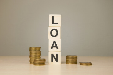 Stack of wooden cubes word loan