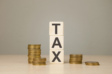 Wooden cubes with the word tax