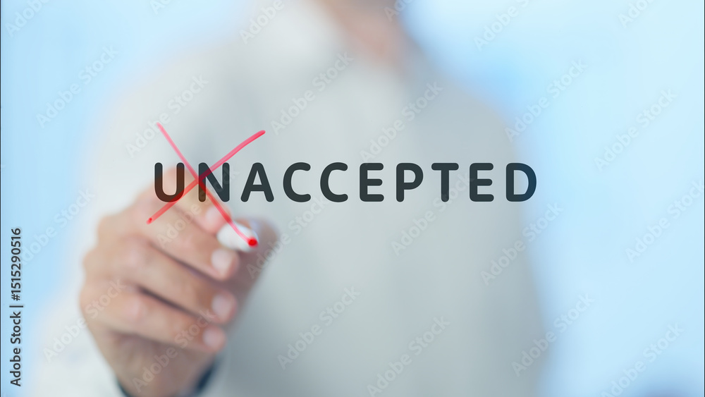 Leinwandbilder businessman writing and crossing out the word unaccepted on a transparent board, changing its meanin