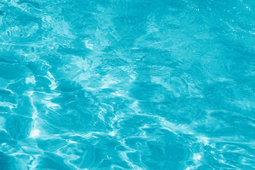 Turquoise rippled water texture background. 