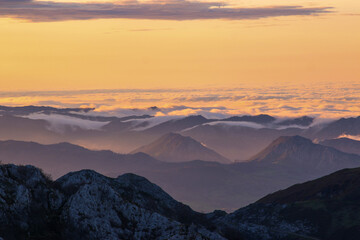 Serene Mountain Landscape at Cloudy Sunset