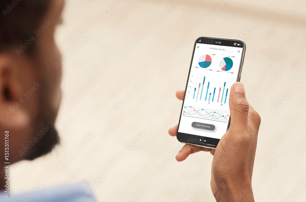 Aufkleber cropped of black man using analytics mobile app on smartphone, checking his incomes on trading stock