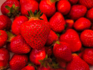 Freshly picked strawberries showing vibrant red color and texture