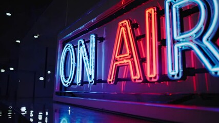 Illuminated ON AIR broadcasting sign combining blue and red neon lights creating atmospheric mood, perfect for media, radio and entertainment industry concepts - Powered by Adobe