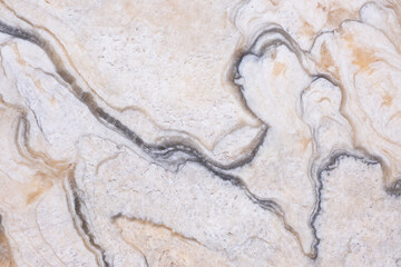 Raw marble stone textured surface background.