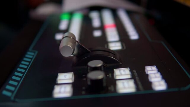 Video switcher control levers changing position during live broadcasting