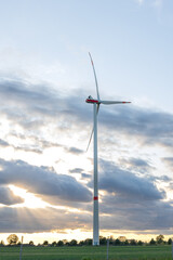 Single wind turbine. Sunset. Rural landscape