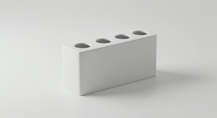 Obraz premium White rectangular block with holes on white background