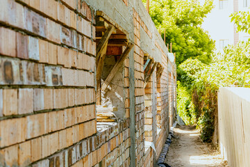 construction residential new house in progress at building site. High quality photo