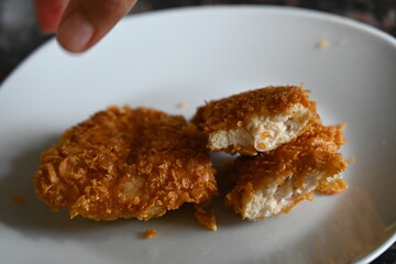 fried chicken nuggets in breading