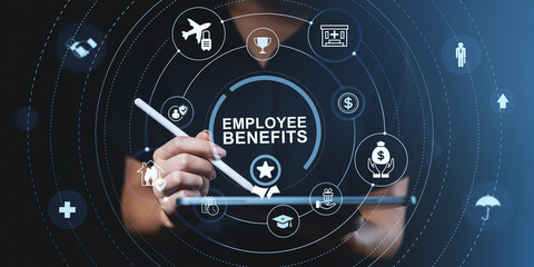 Employee benefits concept with business icons around digital tablet in professional hand on dark blue background, representing workplace compensation..