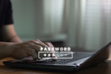 Hand typing computer laptop to input password for technology security system and prevent hacker....