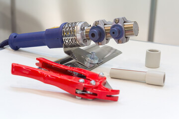 Welding machine for polypropylene pipes.