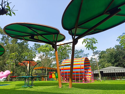 a clean and bright playground during the day - Powered by Adobe