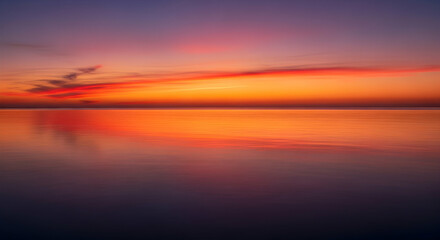 Serenity Unveiled Radiant Sky Reflecting on Calm Water at Twilight