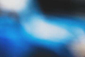 Blurred plain blue gradient with light noise effect. Background for designers.