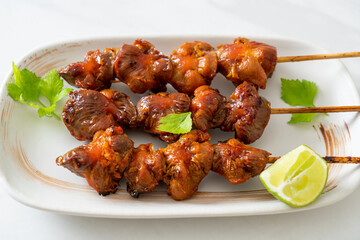 grilled chicken gizzard skewer with herbs and spices