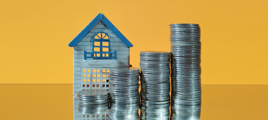 Investment strategies for real estate building wealth with coins home model business environment captivating viewpoint