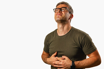 Man experiencing discomfort while holding his stomach