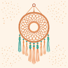 A delicate macramé wall hanging with soft fringe in a boho look