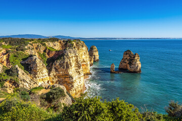 Ponta da Piedade is a unique rock formation with famous grottos in the ocean at Lagos, Algrave, Portugal