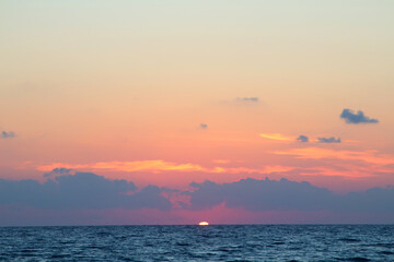 Sunset at the sea with clouds and orange sky, background (Preveza, Greece)
